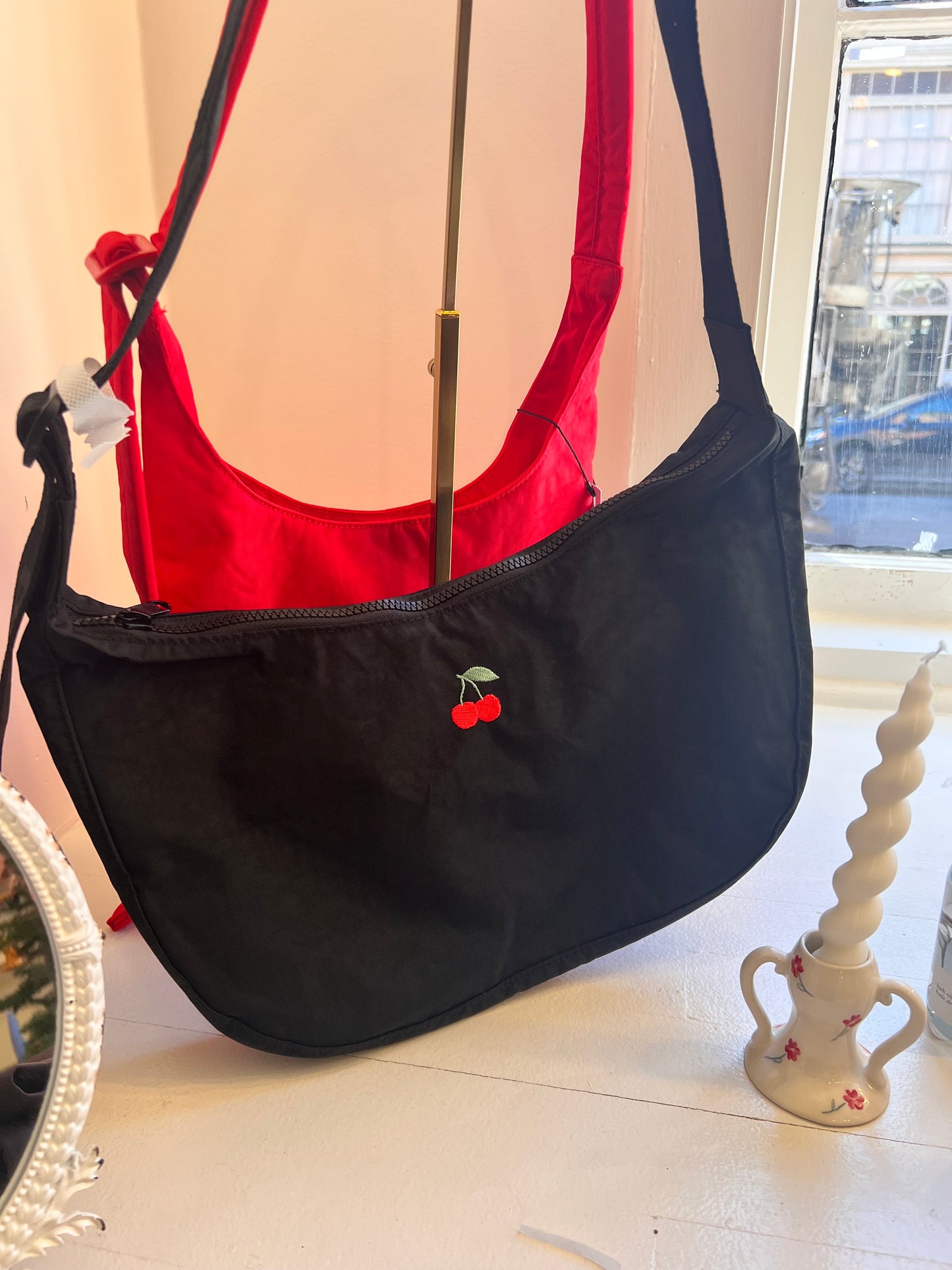 Cherry Embroidered Medium Nylon Crescent Bag by Baggu