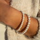 pearl bracelets being worn