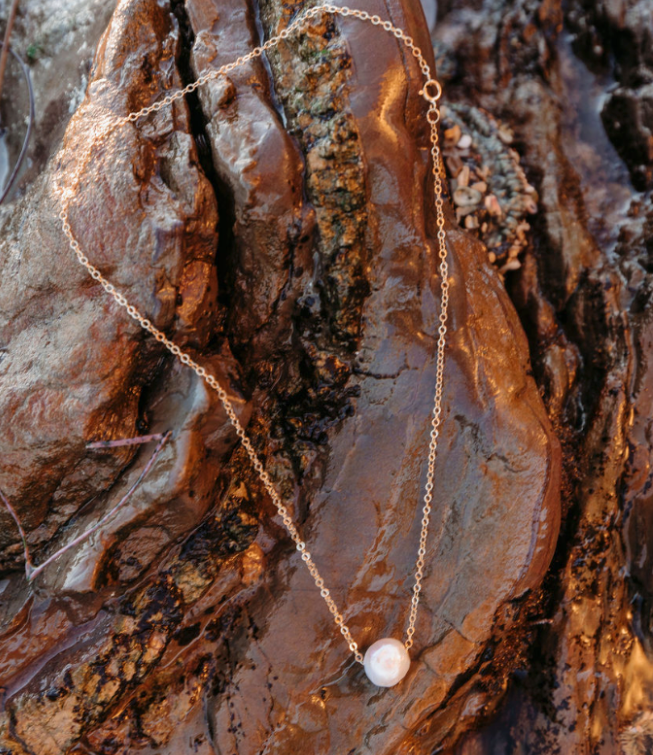 necklace on rock