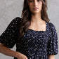 Smocked Peplum Top